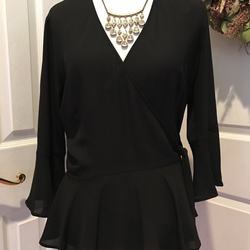 Black crossover peplum top w side tie